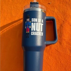 Blue 'Son of a Nutcracker' Insulated Travel Mug with Handle